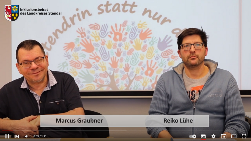 Videoausschnitt, auf dem die Vorsitzenden des Inklusionsbeirates Reiko Lühe und Marcus Graubner zu sehen sind.